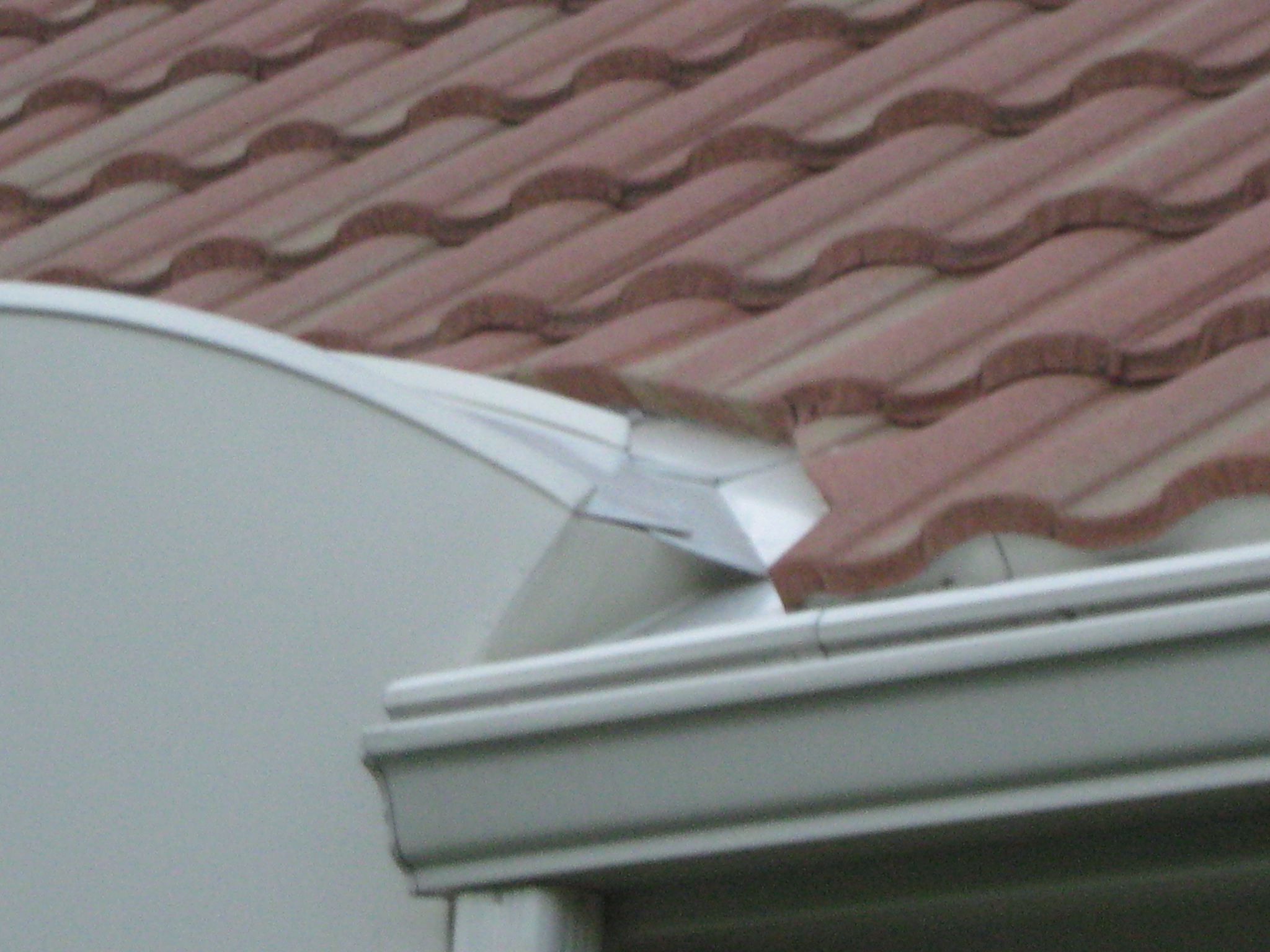 Terracotta Metal Tile Roof — detail photo 2