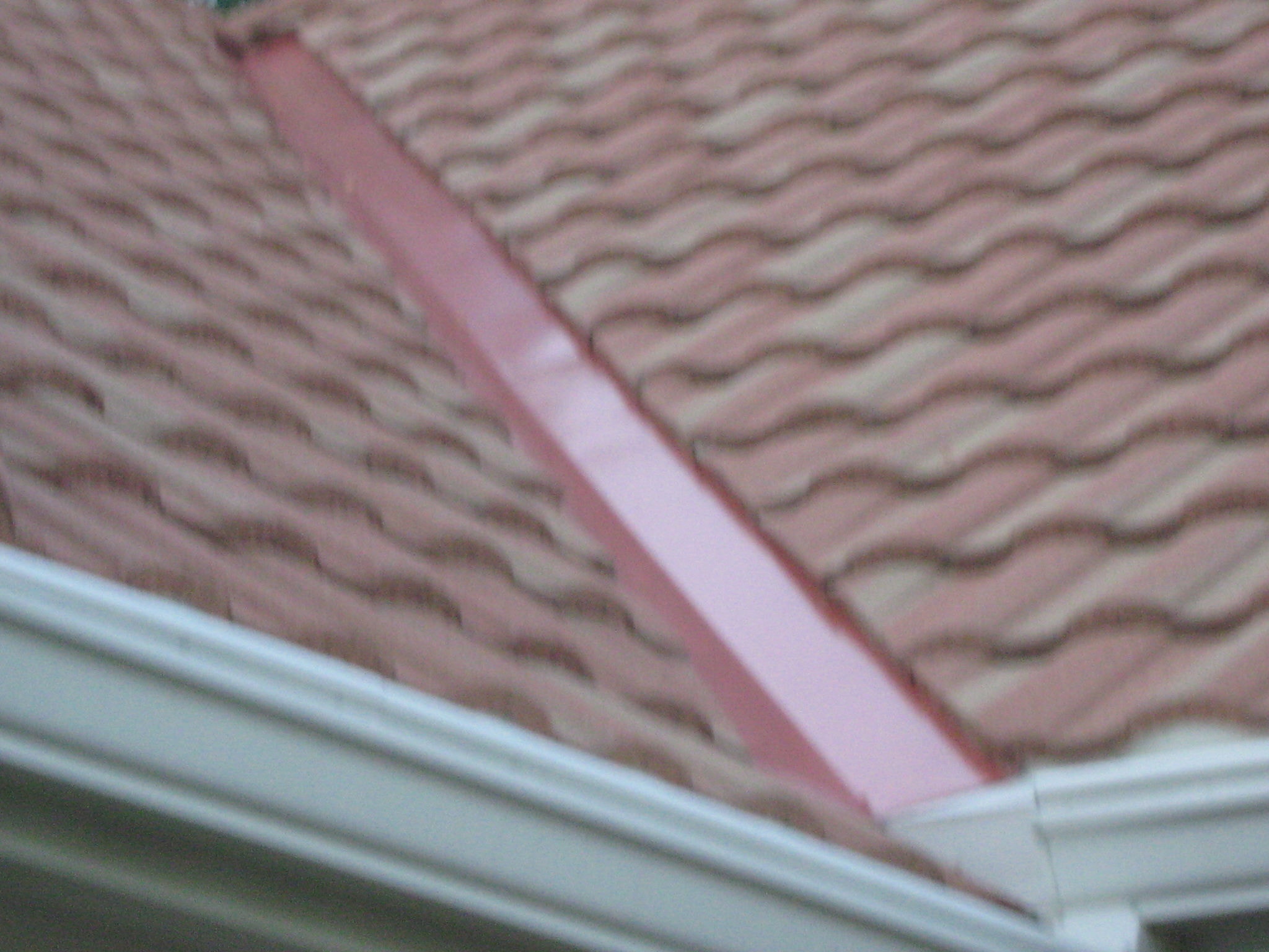 Terracotta Metal Tile Roof — detail photo 3