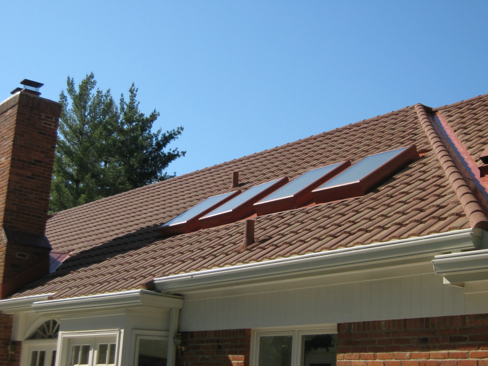 Terracotta Metal Tile Roof — detail photo 5